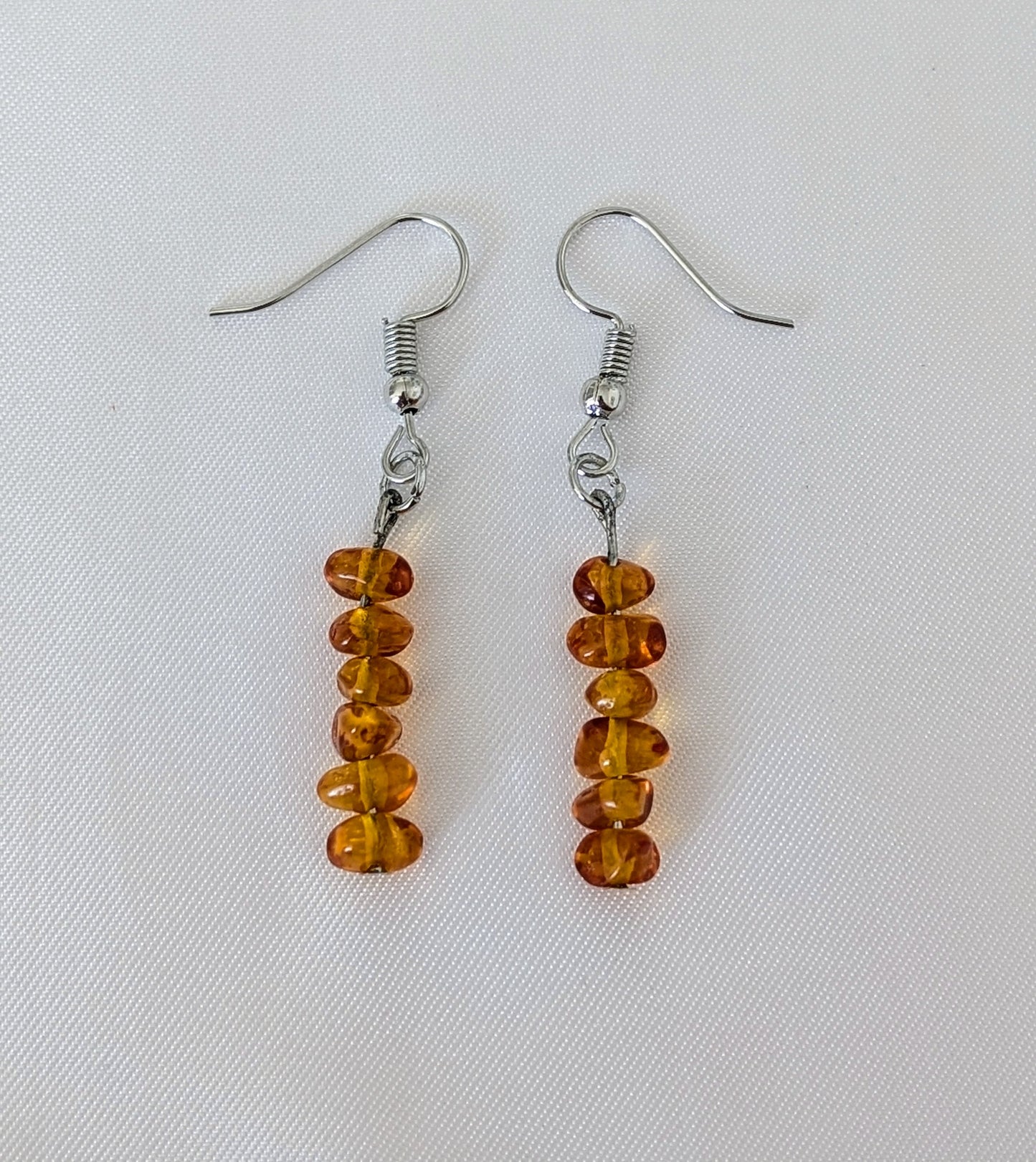 Collier fait main en ambre baltique naturel, pierre de couleur miel montée sur chaîne en acier inoxydable hypoallergénique, bijou artisanal pour femme, style bohème et lithothérapie